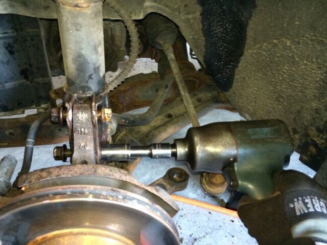 I disconnected the tie rod to make room
