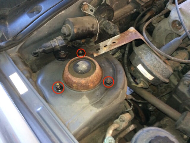 Front passenger side top strut nut locations