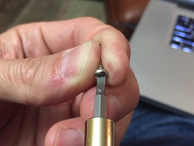 Flat tip screwdriver fitting in a security T10 Screw Head