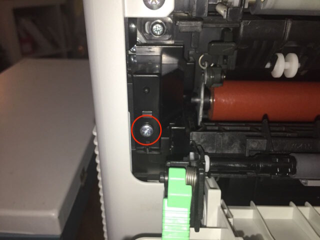 Location of left roller cover screw