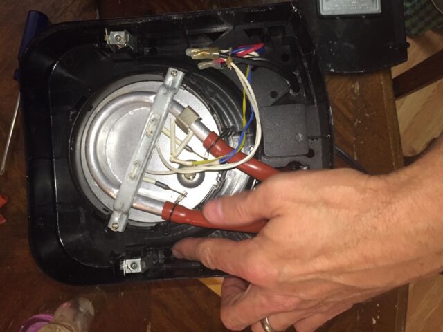 Hoses reinstalled on heating element