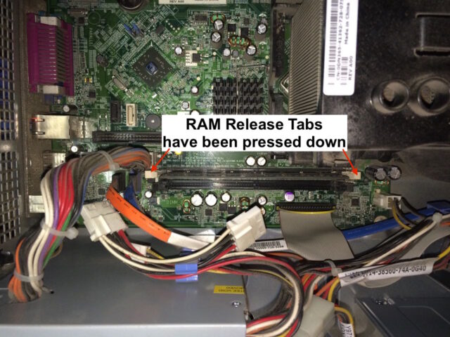 Dell 320 RAM Upgrade-RAM Release Tabs Pressed