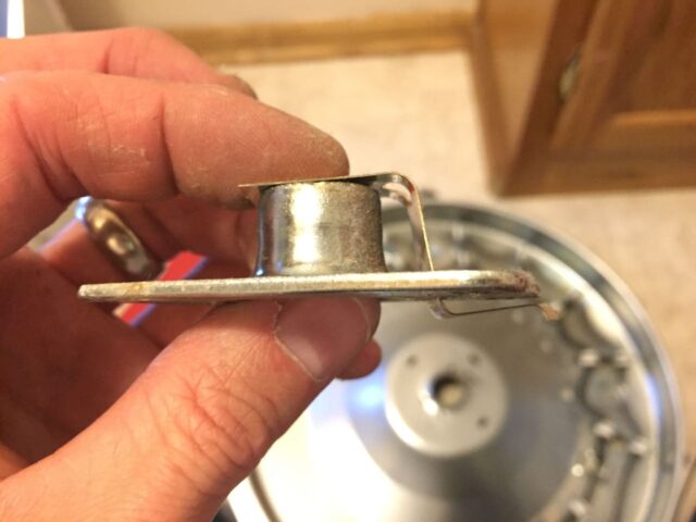 This is how the ground strap fits through the retainer bearing