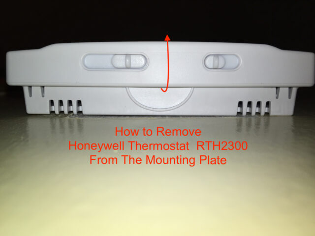 Bottom View of thermostat where you pull to release it from the mounting plate