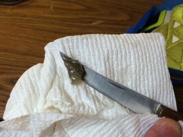 Glue on knife removed from shoe