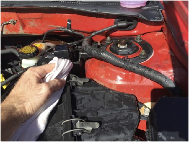 Cleaning engine components by hand