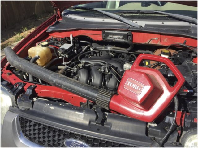 Drying engine bay with leaf blower