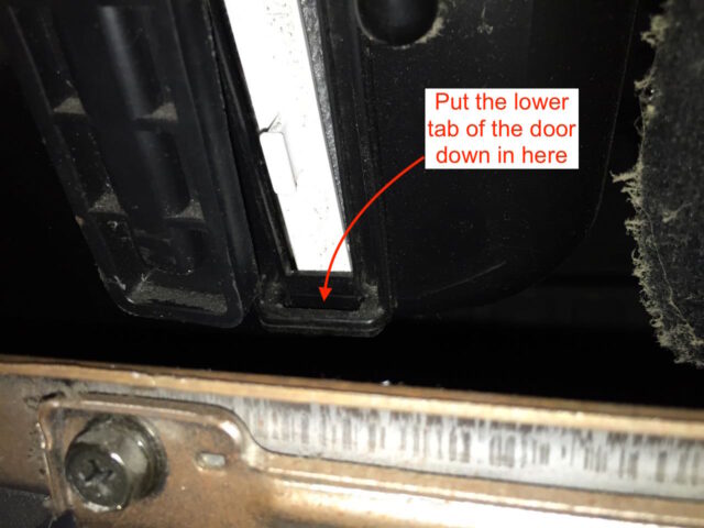 Directions for reinserting the bottom of the filter door