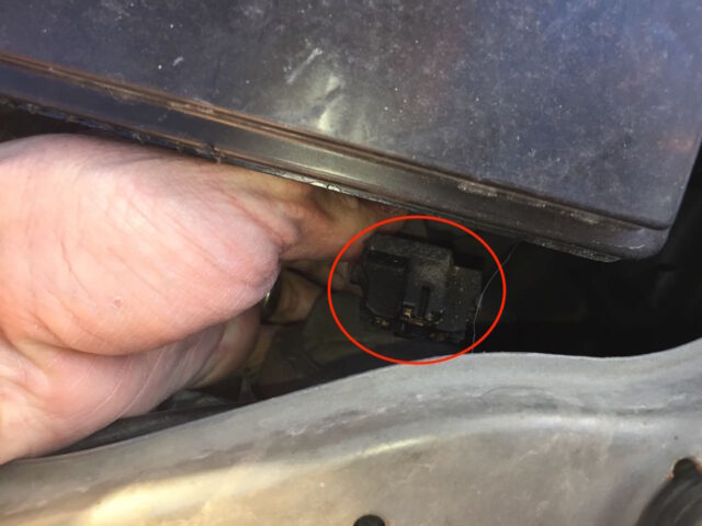 The headlight electrical connector removed