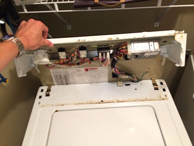 Kenmore 90 Series Washer Fills Slowly-Flipping the Control Panel Back into Place