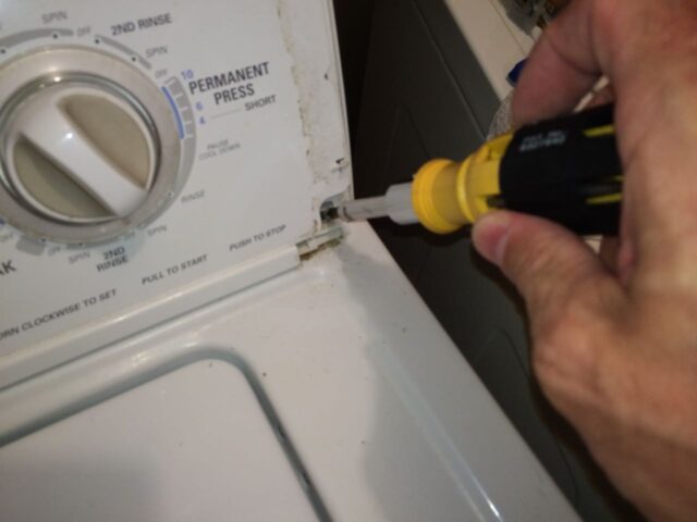 Kenmore 90 Series Washer Fills Slowly-Reinstalling Right Control Panel Screw