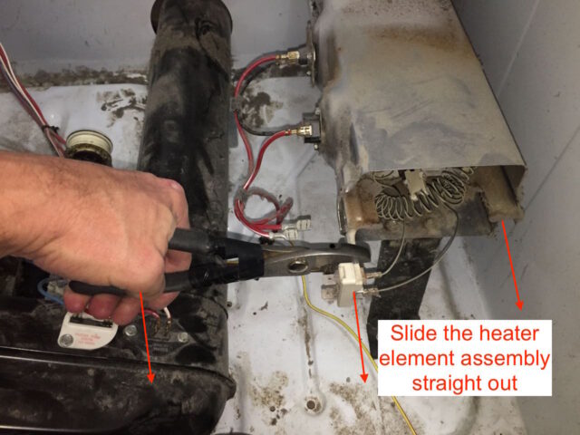 Pulling out the heater assembly with a pliers