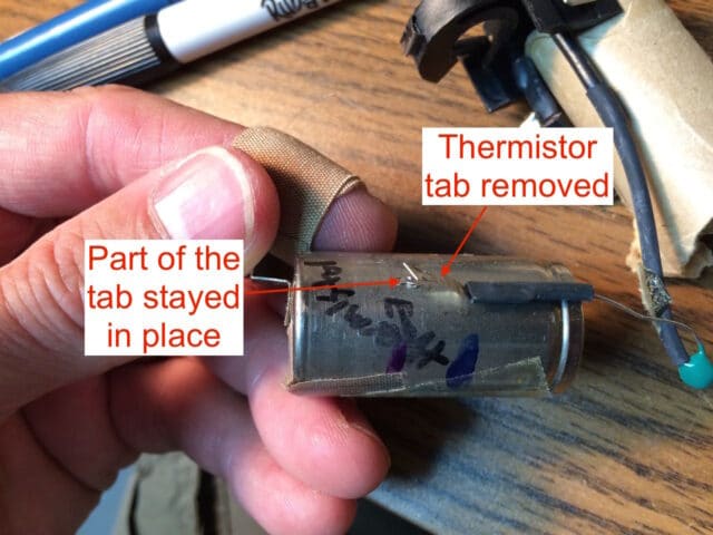Thermistor spot welded tab removed from the cell