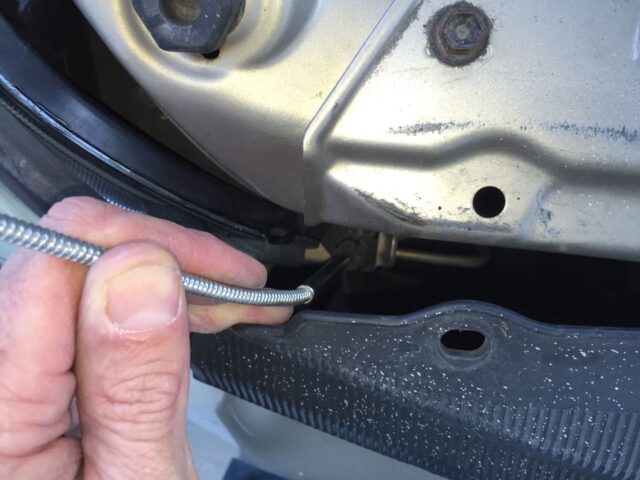 Using my flexible grabber to start the screw