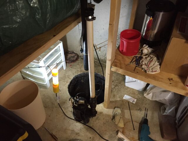 Sump pump removed from the pit
