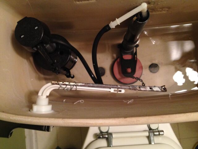 New toilet flusher arm extended