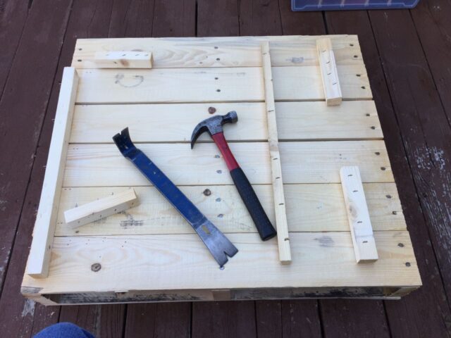 Nail Bar and Hammer on Pallet