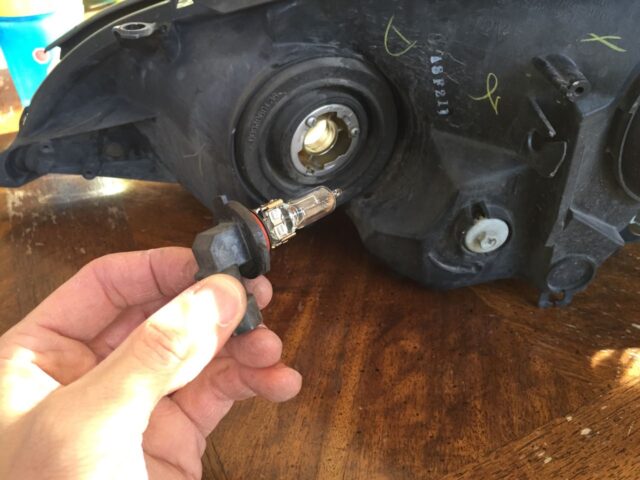 The inner headlight bulb removed