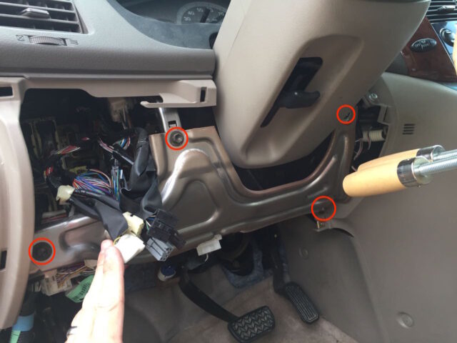 Lower driver's dash metal panel bolt locations