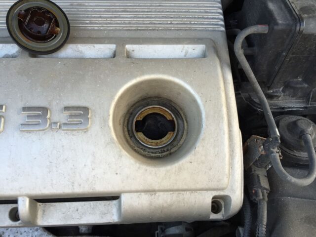 Picture of oil fill cap removed and set aside