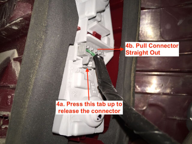 Press the tab and pull out the electrical connector