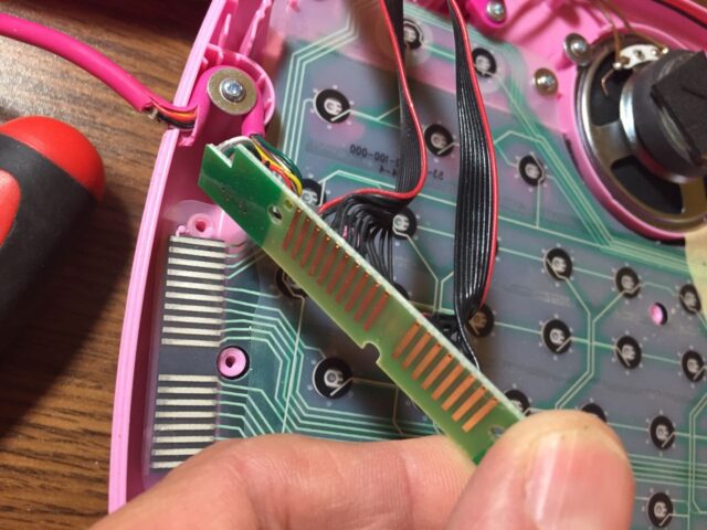 The back side of the small laptop circuit board shows that this is a cheap connector
