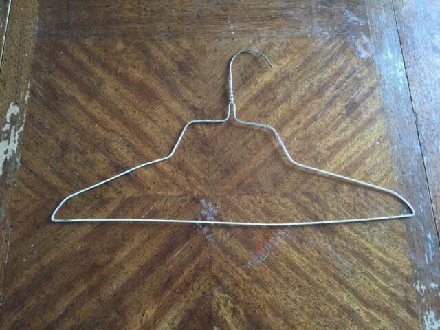 Wire hanger for fixing our table